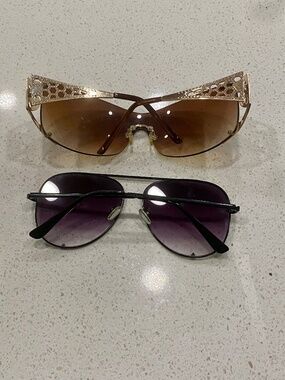 2-pairs of sleek 90s  sunglasses, great condition.